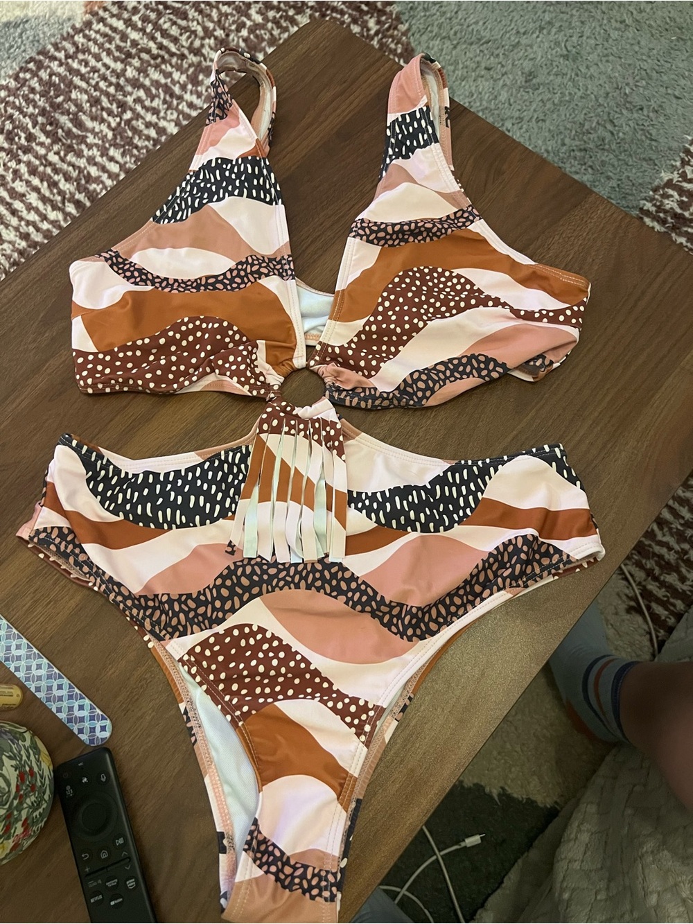Super cute design, one piece swimsuit with cut outs!